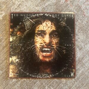 Tooth Fang & Claw by Ted Nugent's Amboy Dukes, released in 1974. Vintage Album